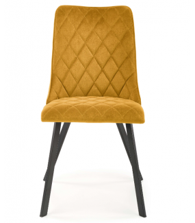 Krzesło CESAR żółte umieszczone w industrialnych wnętrzach nieco ociepli ich surowy z natury charakter.