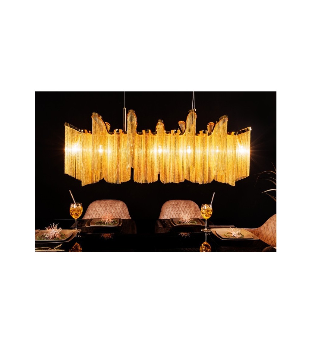 Lampa wisząca ZWINGER złota sprawdzi się w stylu klasycznym, boho, glam czy nowoczesnym.