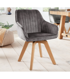 Krzesło szare aksamit podkreśli charakter skandynawskiej aranżacji jadalni lub pokoju.