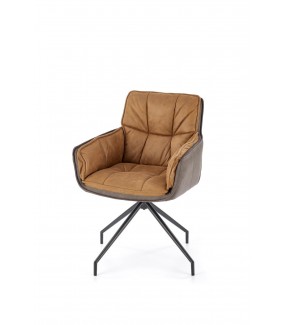 Ciekawe krzesło do salonu urządzonego w stylu nowoczesnym.