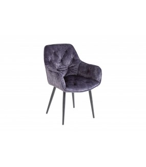 Wygodne krzesło tapicerowane w stylu chesterfield do salonu w stylu glamour. Sprawdzi się w pokoju dziennym